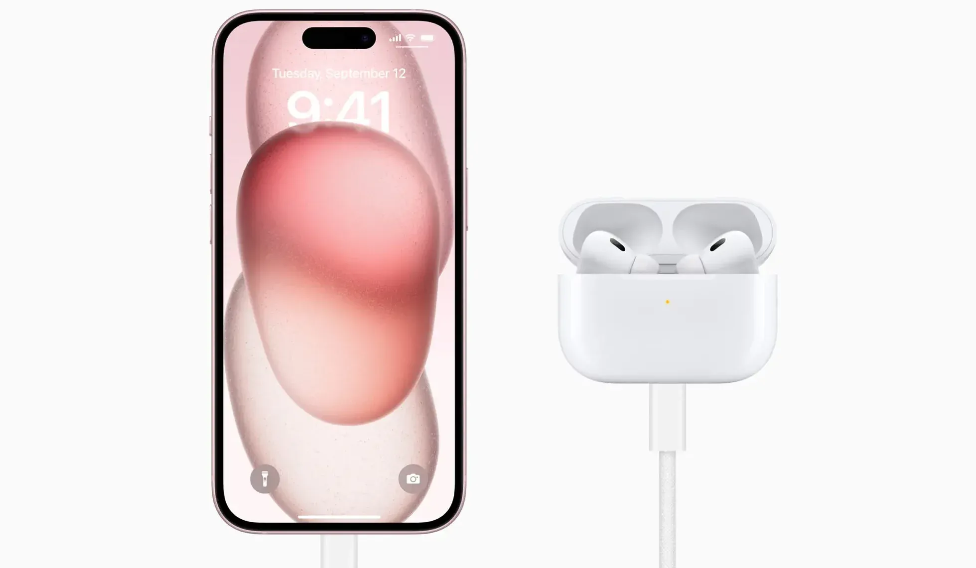 pink screen of apple iphone 15 beside white airpods