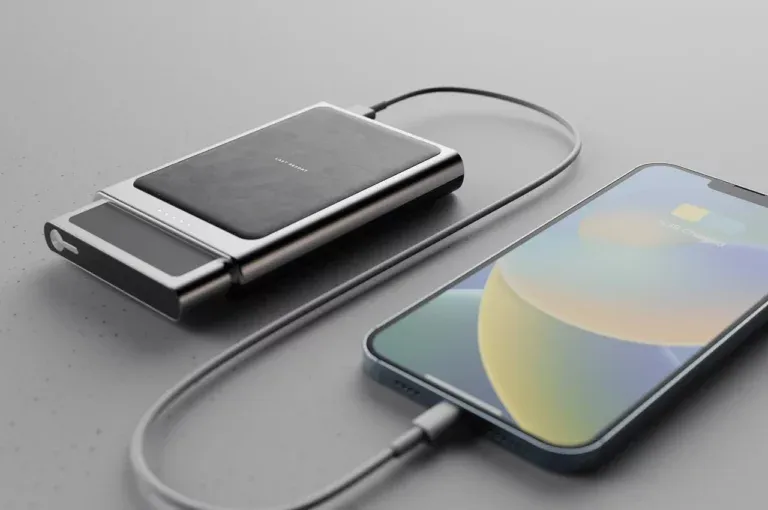 black powerbank charging an iphone