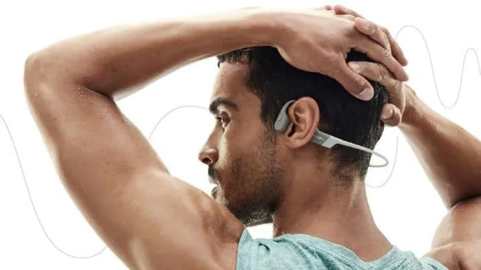 man wearing bone conducting headphones for sports